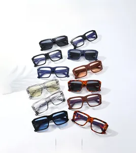 Flat lay display of 12 retro square sunglasses in various colors on a white background
