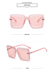 Detail view of pink square oversized sunglasses with wide frame from front and side