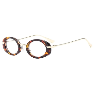 Modern oval tortoiseshell eyeglasses frame with sleek gold metal temples and blue light filter