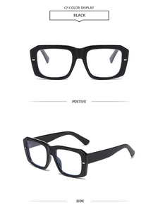 Close-up of stylish black square frame sunglasses with blue light blocking lenses