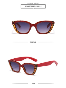 Vue détaillée des lunettes de soleil œil de chat léopard rouge avec verres dégradés violets