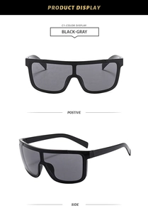 Vues de face et à 45 degrés de lunettes de soleil demi-cerclées oversize noir mat
