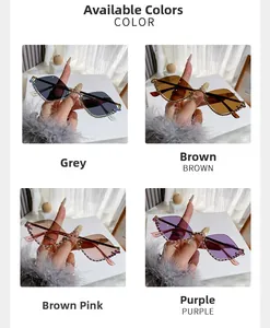 Four colors of diamond-encrusted cat eye sunglasses: Grey, Brown, Brown Pink, and Purple