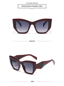 Détail de lunettes de soleil œil-de-chat marron rouge avec verres dégradés et branches déco
