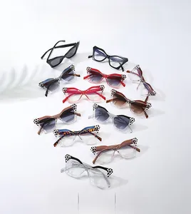 Flat lay of cat-eye butterfly frame sunglasses in various colors and spotted patterns
