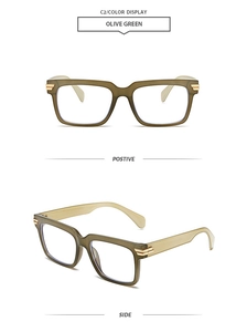 Detail view of olive green square frame glasses with gold metal hinge accents