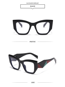 Vue détaillée des lunettes œil de chat avec monture noire et blocs de couleur latéraux