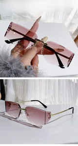 Detail of rimless rectangle sunglasses featuring gradient light brown lenses and gold metal arms