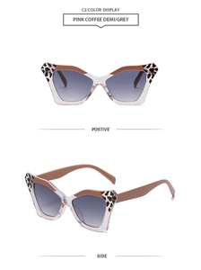 Detail view of pink coffee demi cat eye sunglasses with grey gradient lenses and side arms