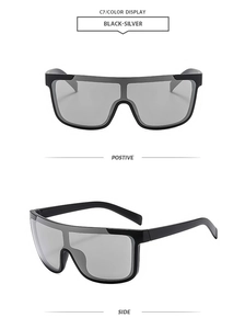 Détails de face et de profil des lunettes de soleil masque surdimensionnées noir et argent