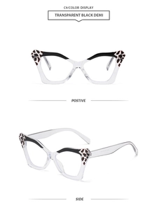 Detail view of cat eye butterfly glasses with transparent black demi leopard frame