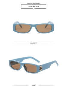 Vue détaillée des lunettes de soleil bleues rectangulaires avec verres bruns et accents dorés