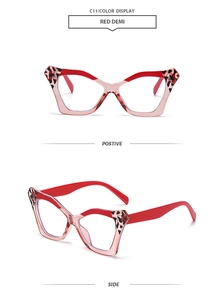 Detail view of red demi butterfly frame sunglasses with leopard print accents