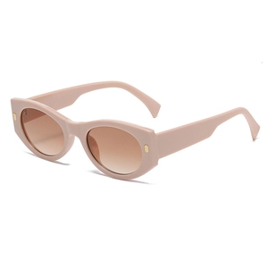 Modern cat-eye sunglasses with beige thick frames and brown gradient lenses