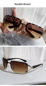 Close-up of rimless gradient brown sunglasses with sparkling rhinestone embellishments