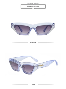 Detail view of purple transparent cat-eye sunglasses with golden hinge accents and gradient lens