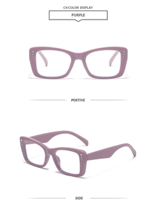 Detail view of purple rectangular sunglasses with three rhinestones on the frame side