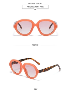 Detail view of large round orange frames with pink gradient lenses and tortoiseshell temples