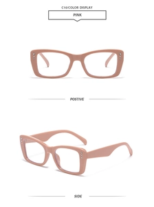 Detail of pink rectangular sunglasses with sparkling rhinestone trim on the frame