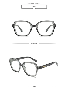 Detail view of transparent grey square frames with gold decorative side metal accents