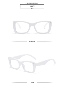 Macro view of white square sunglasses frame with rhinestone accents and wide temples