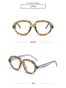 Detail of fashion floral oversized sunglasses with shell patterns and translucent grey temples