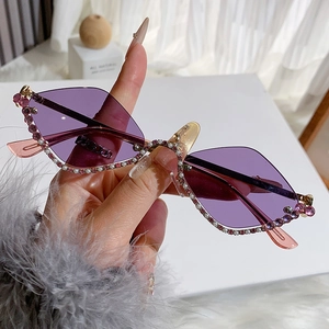 Fashionable diamond-studded rhombus sunglasses with purple lenses and gold metal frames