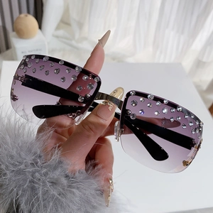 Cool rimless oversized sunglasses with purple gradient lenses and sparkling rhinestones
