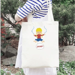 Cartoon girl jumping rope printed white canvas tote bag shown in outdoor setting