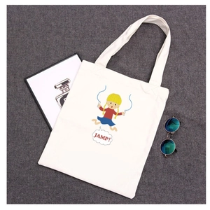 White canvas tote bag featuring cute cartoon girl jumping rope and JAMP text