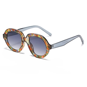 Fashionable oversized retro sunglasses with unique colorful marbled texture and grey gradient lenses