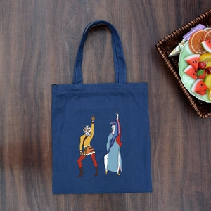 Dark blue canvas tote bag with cartoon Chinese opera characters on a wooden background