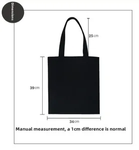 Size chart showing height 39cm, width 34cm and strap drop 25cm of the black canvas tote bag