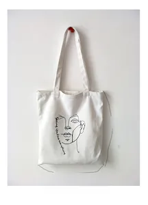 Detail view of canvas tote bag showing black and white sketch art and 34cm x 39cm dimensions