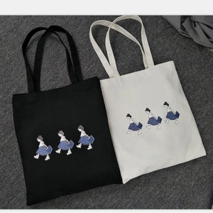 Black and cream canvas tote bags with girl illustration in minimalist Japanese style