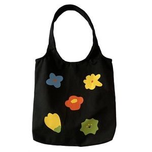 Borsa tote in tela nera con stampa floreale astratta colorata e manici a spalla piatti