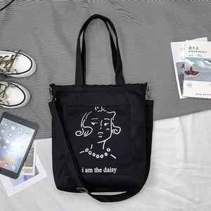 Sac fourre-tout en toile noire avec portrait artistique et bandoulière réglable