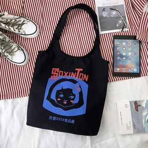 Retro black canvas tote bag with artistic girl print and bold typography for daily use