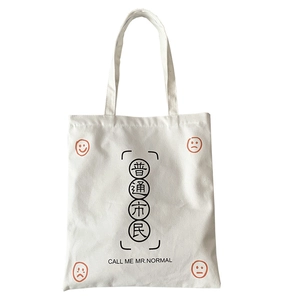 White canvas tote bag with orange emoji prints and CALL ME MR.NORMAL slogan