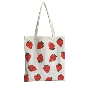 Large white canvas tote bag with red strawberry print for women and students