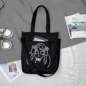 Sac fourre-tout noir en toile avec motif dessin animé et bandoulière amovible