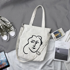 Sac fourre-tout en toile blanche avec portrait artistique et bandoulière amovible