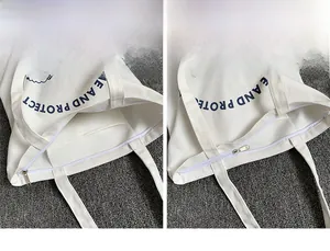 Vue détaillée du sac cabas en toile blanche avec fermeture éclair et poche intérieure