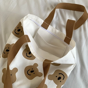 Sac fourre-tout en toile blanche avec motif ours brun et fermeture éclair sécurisée