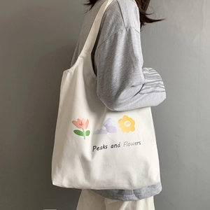 Japanese style white canvas tote bag with floral print and Peaks and Flowers text