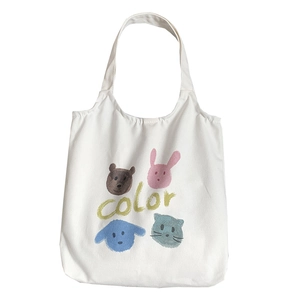Japanese style white canvas tote bag with cute cartoon animal prints and color lettering