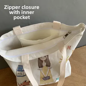 Top view of canvas tote bag showing zipper closure and interior pocket with milk illustration