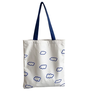 Sac fourre-tout minimaliste en toile crème avec motifs de nuages bleus et anses