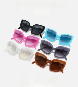 Close-up of cat-eye square sunglasses in six assorted colors with gradient lenses