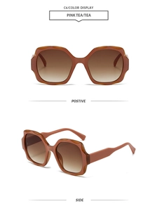 Macro detail of geometric wavy square sunglasses in pink tea with gradient lenses